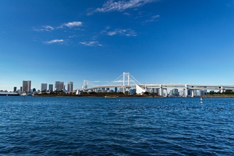 A view of Rainbow Bridge in Tokyo from Odaiba.