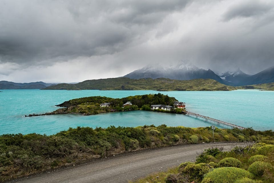 Renting a car and driving in Patagonia: a complete guide hotel torres Hosteria Pehoe - a hotel on an island in lake Pehoe in Torres del Paine national park in Patagonia