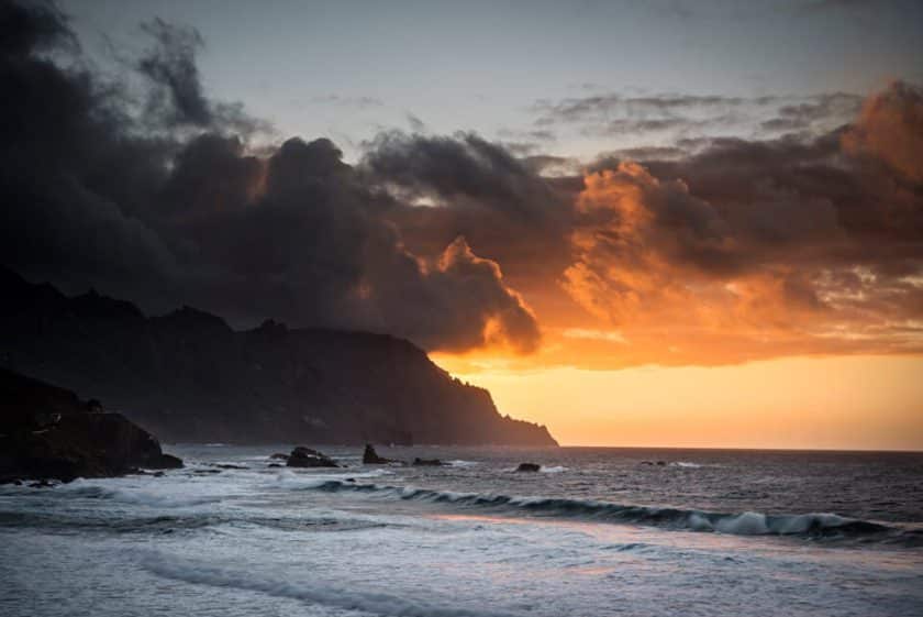 a sunset view in Tenerife with a sea and a cliff from Benijo